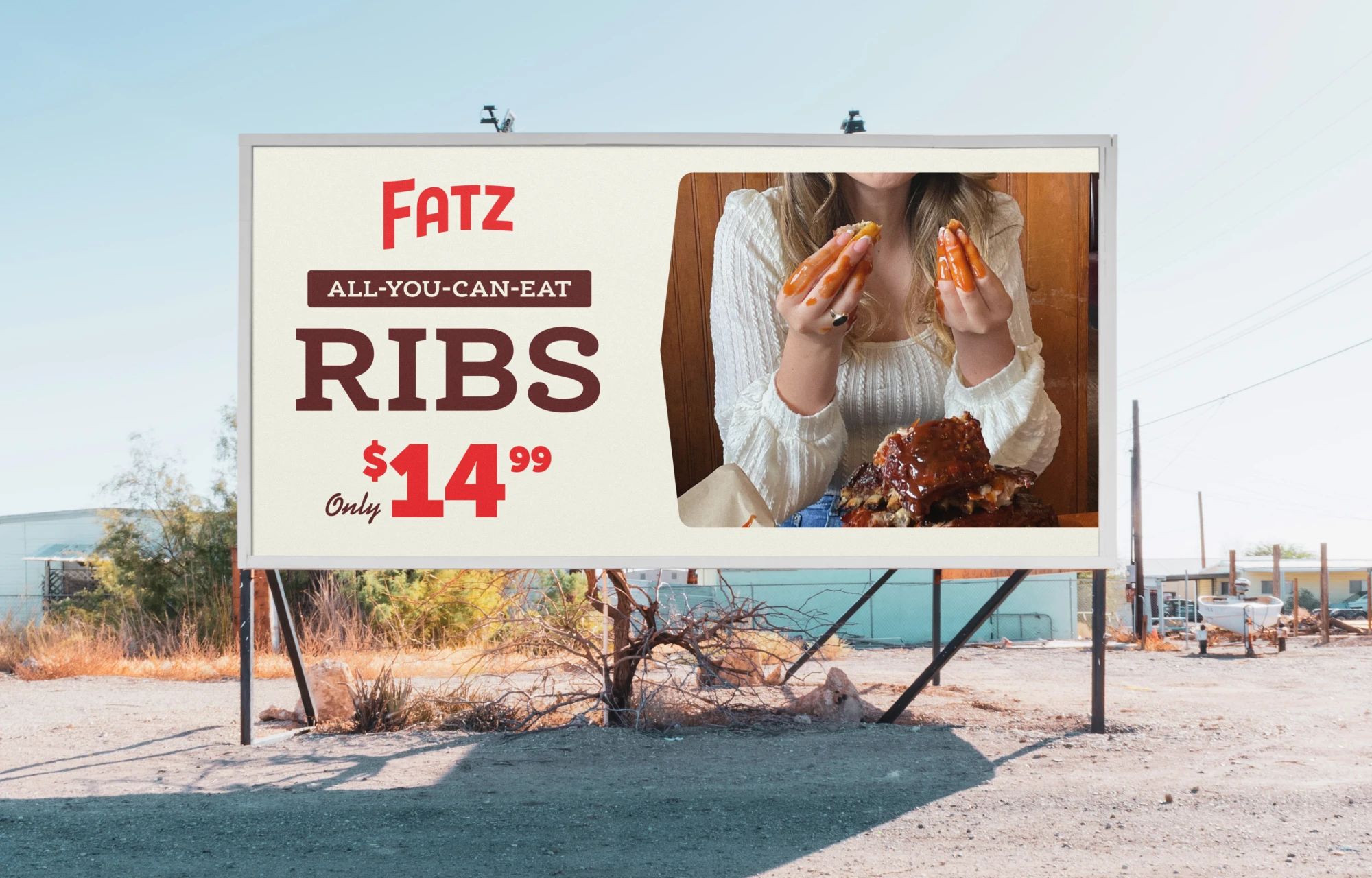 A Fatz billboard mockup showcasing All-You-Can-Eat Ribs
