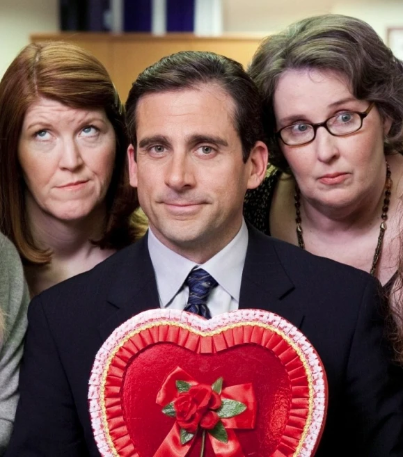The Office Michael holding candy heart box