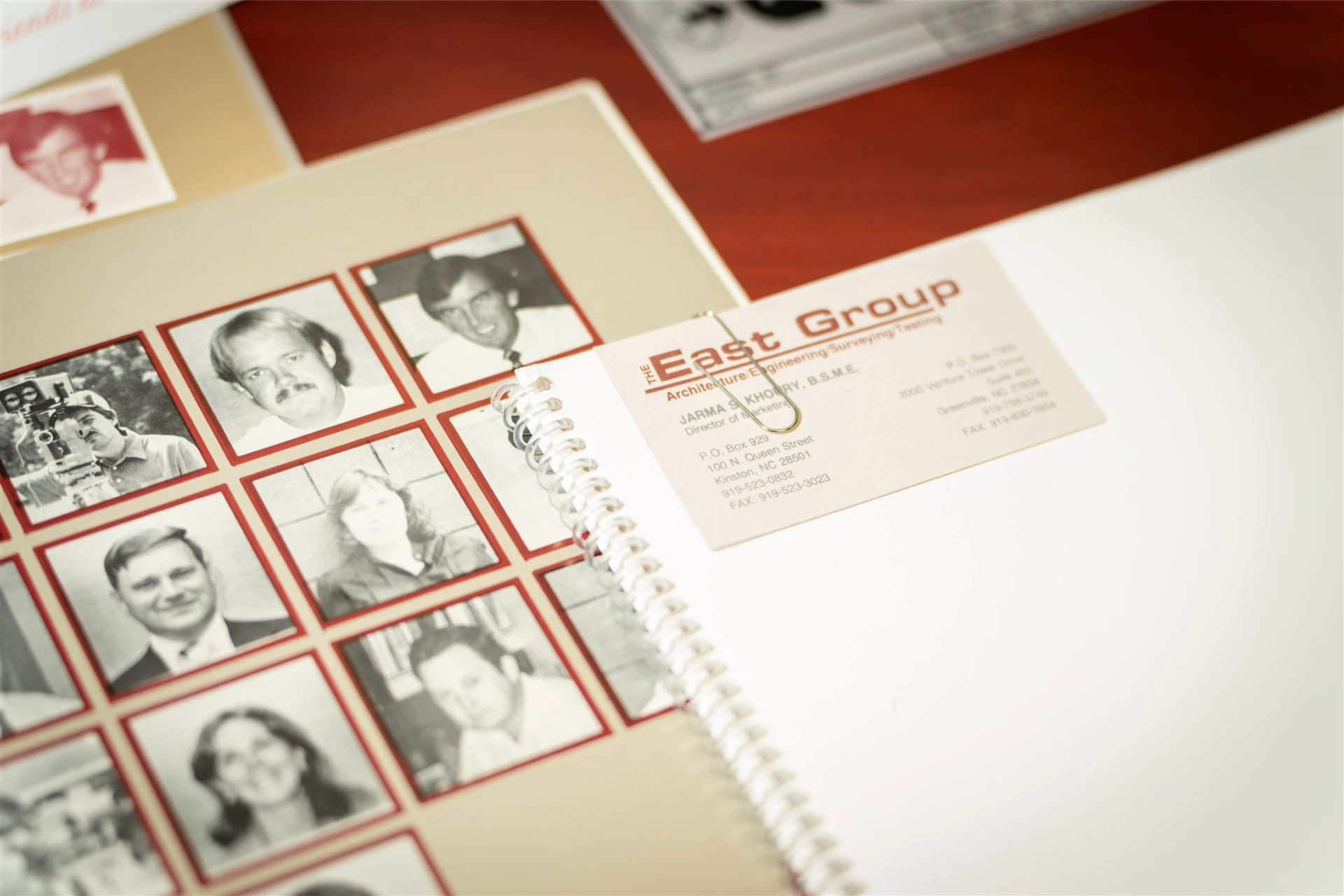 Original 1970s business card and employee photos for The East Group