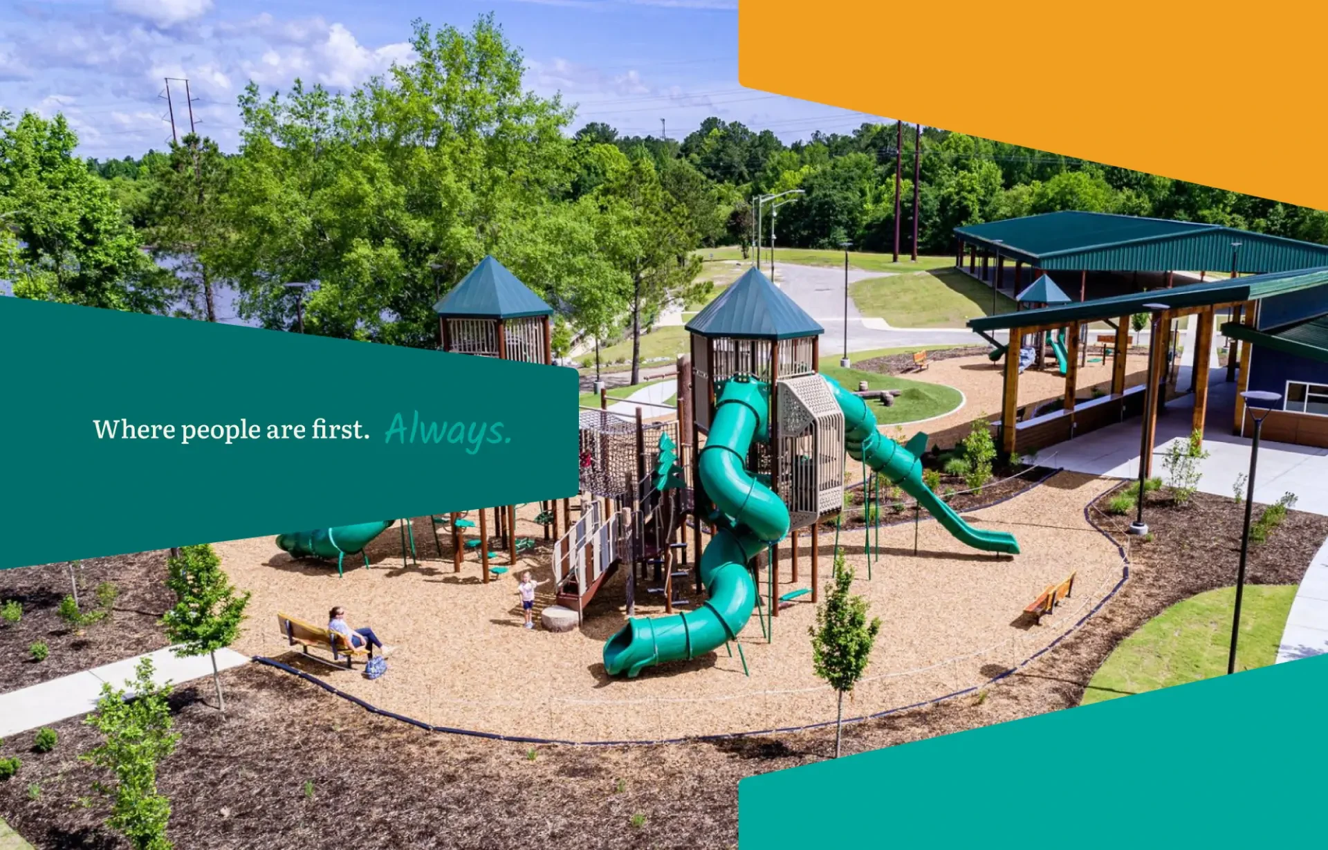 A playground engineered by The East Group, with their tagline 'Where people are first, always' overlaid