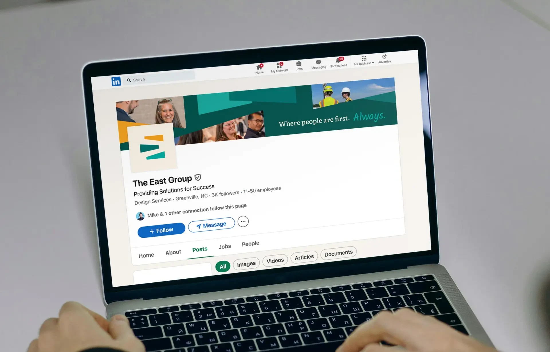A computer showing a LinkedIn profile for The East Group
