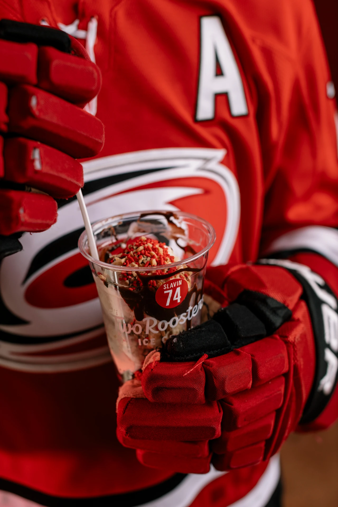 Jaccob Slavin holding a sundae in collaboration with Two Roosters Ice Cream