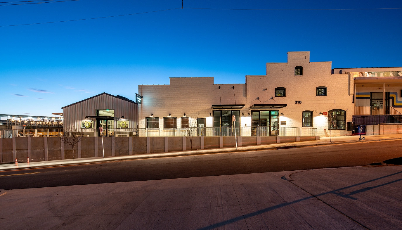 Junction West building in the evening