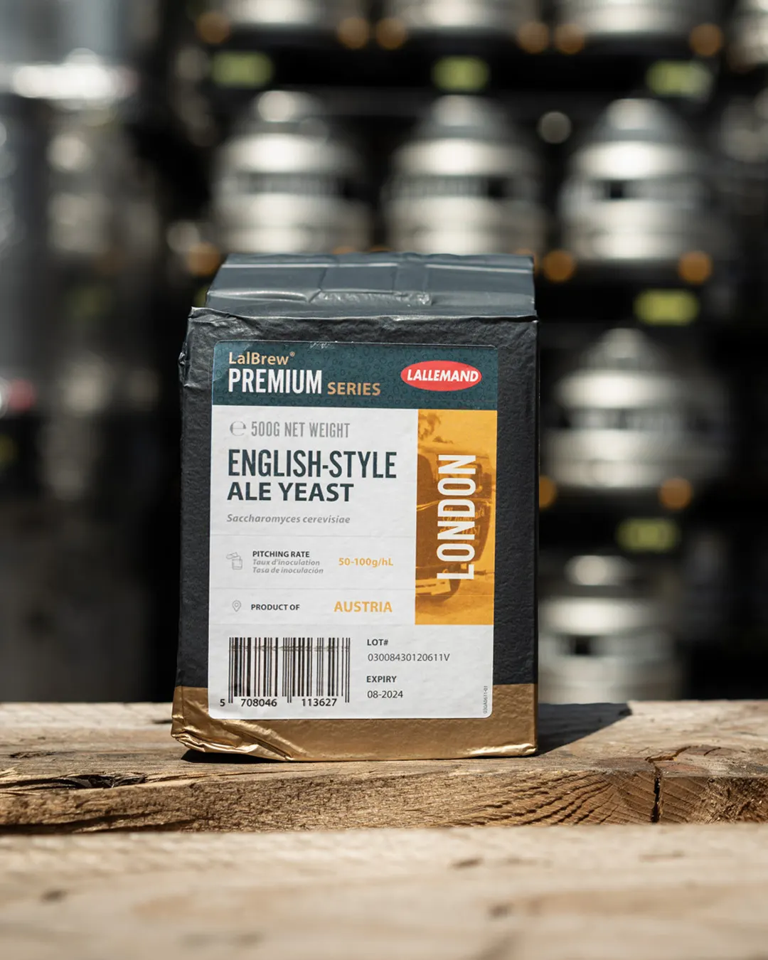 A 500g brick of Lalbrew Premium London english-style yeast sitting on a table in a brewery