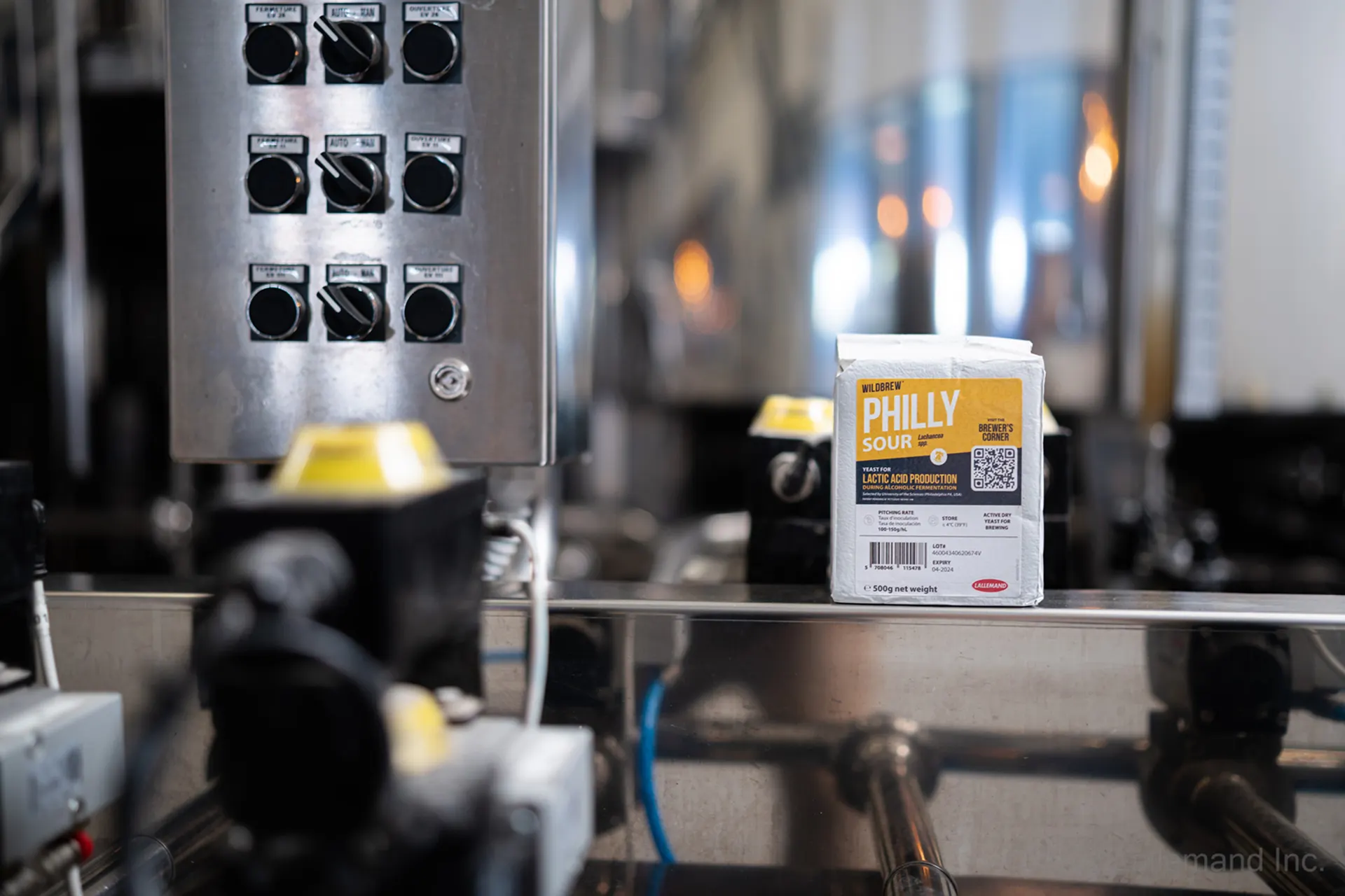 A 500g brick of WildBrew Philly Sour yeast sitting on equipment in a brewery